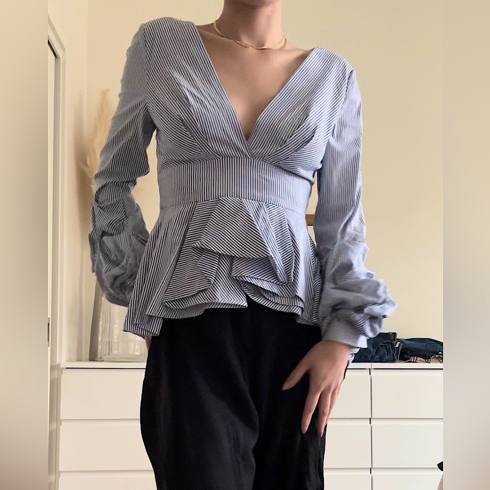 Blouse peplum with long sleeve